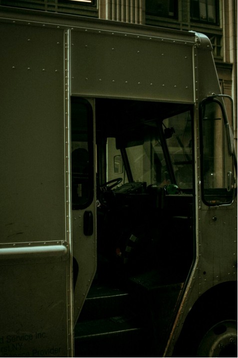 Courier loading parcels